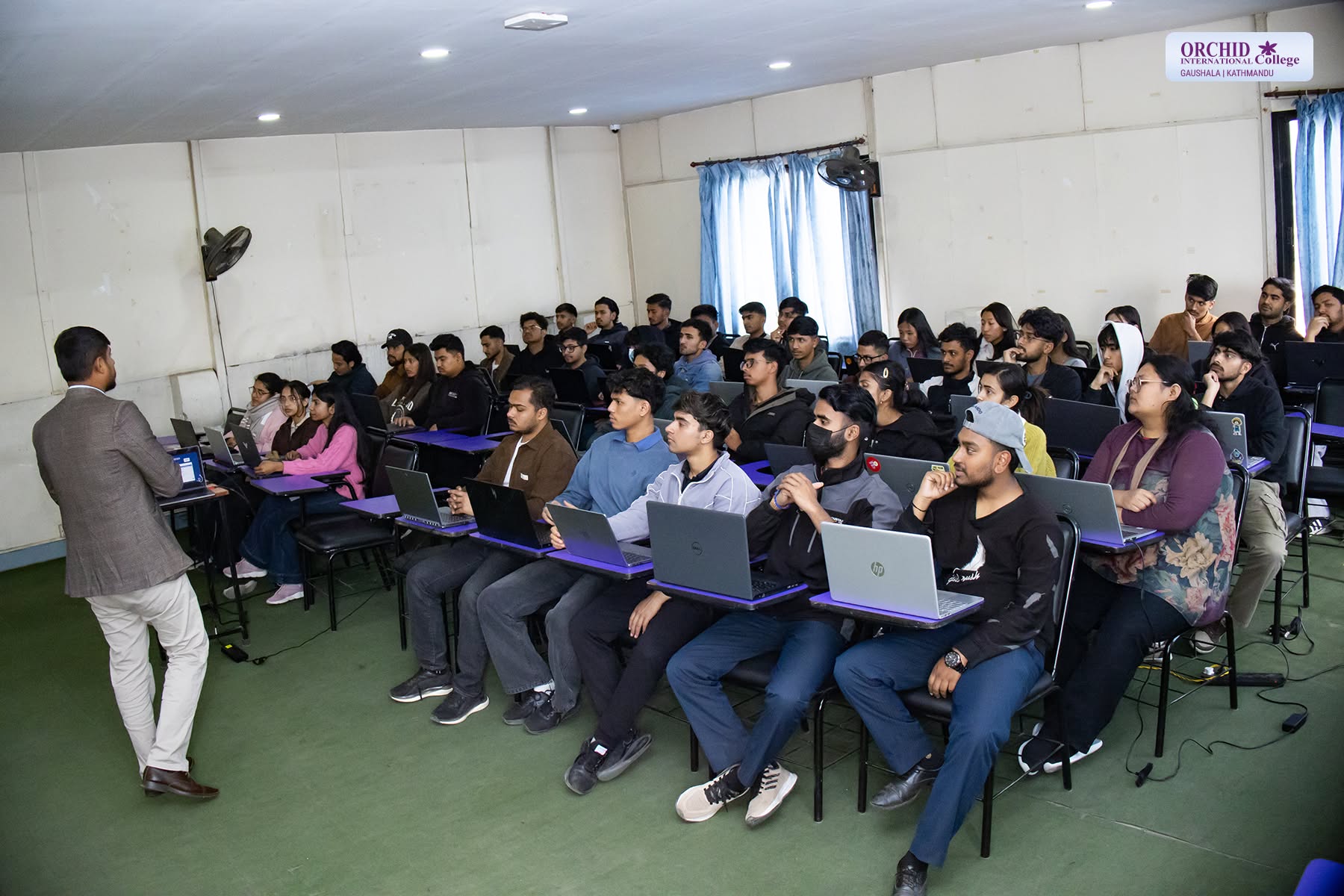 College students attending an innovation and technology workshop
