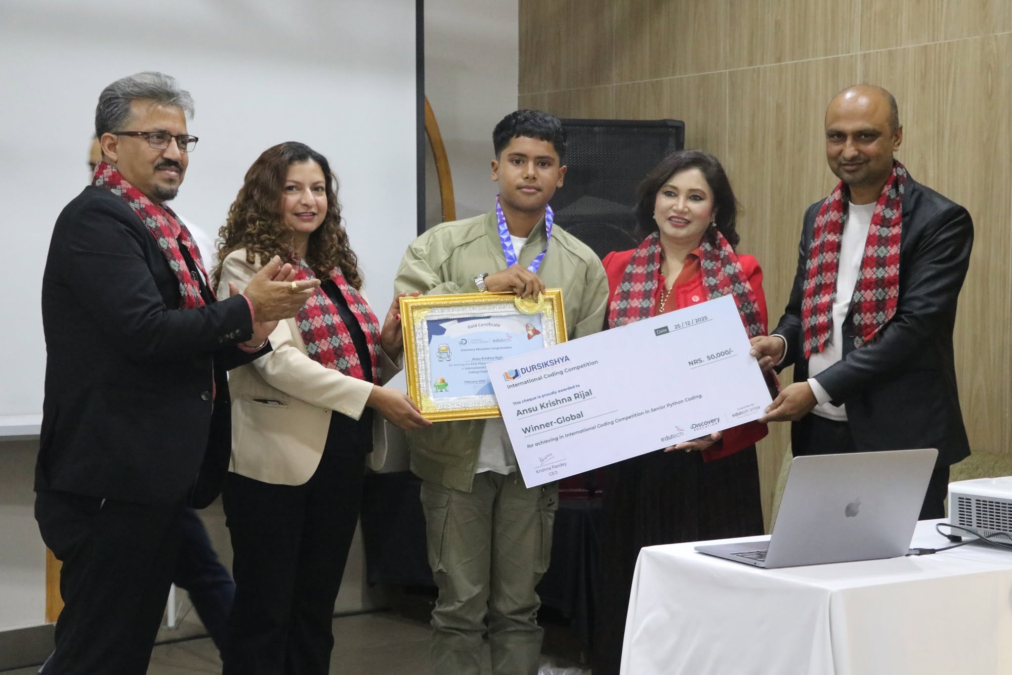 Student being recognised at an international coding and innovation award ceremony