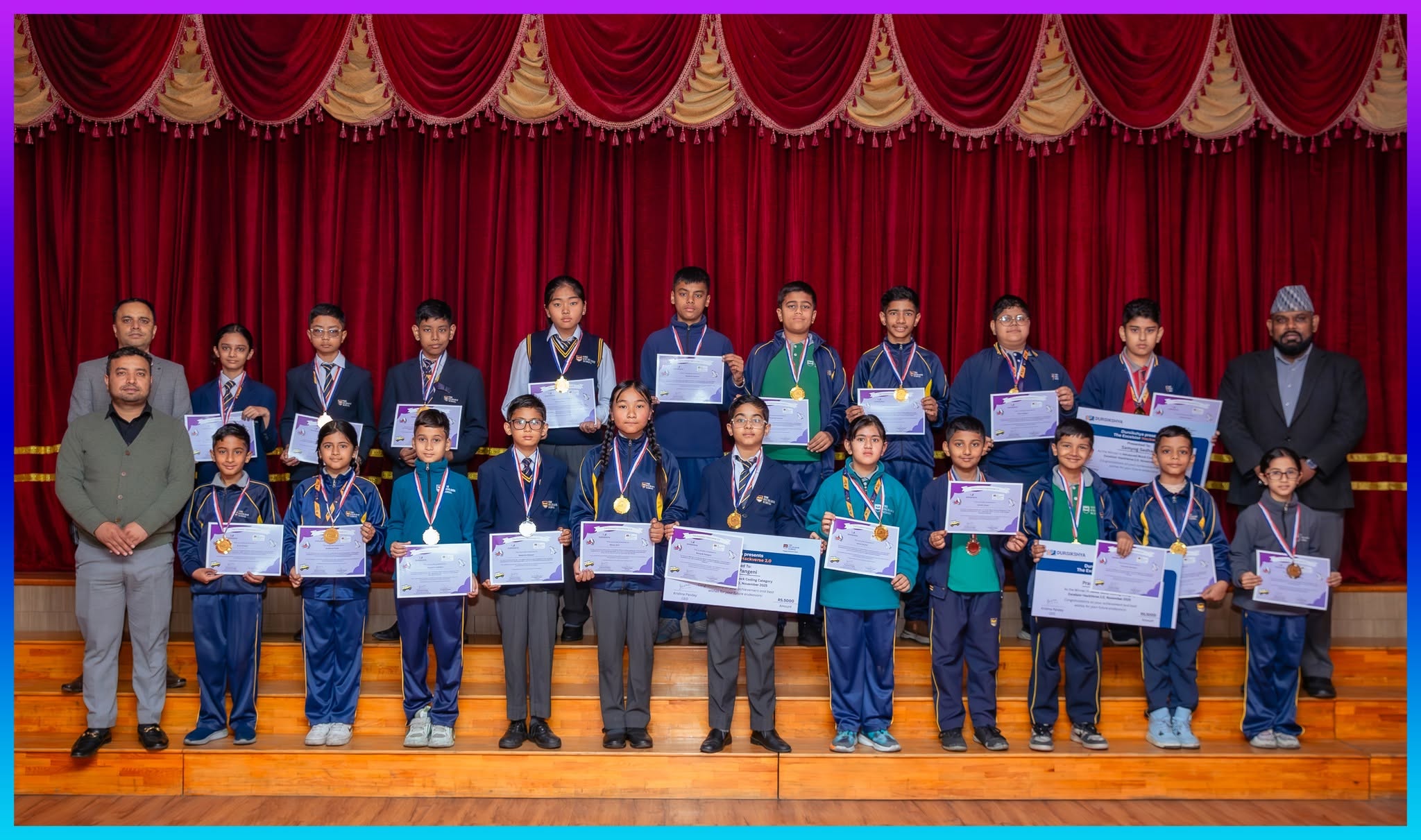 Large group of student winners with certificates and medals on stage