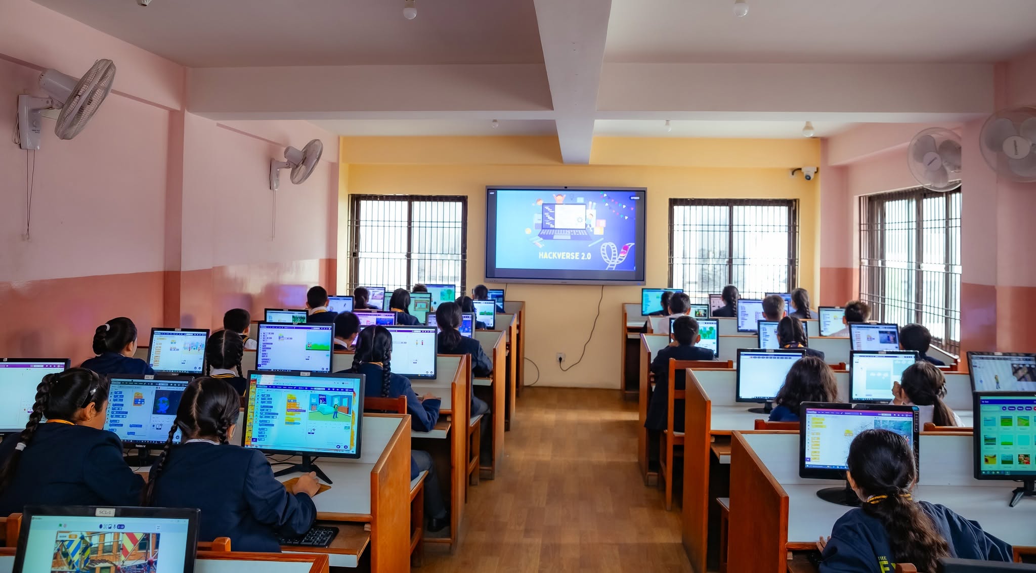 Senior students engaged in a coding and innovation lab session