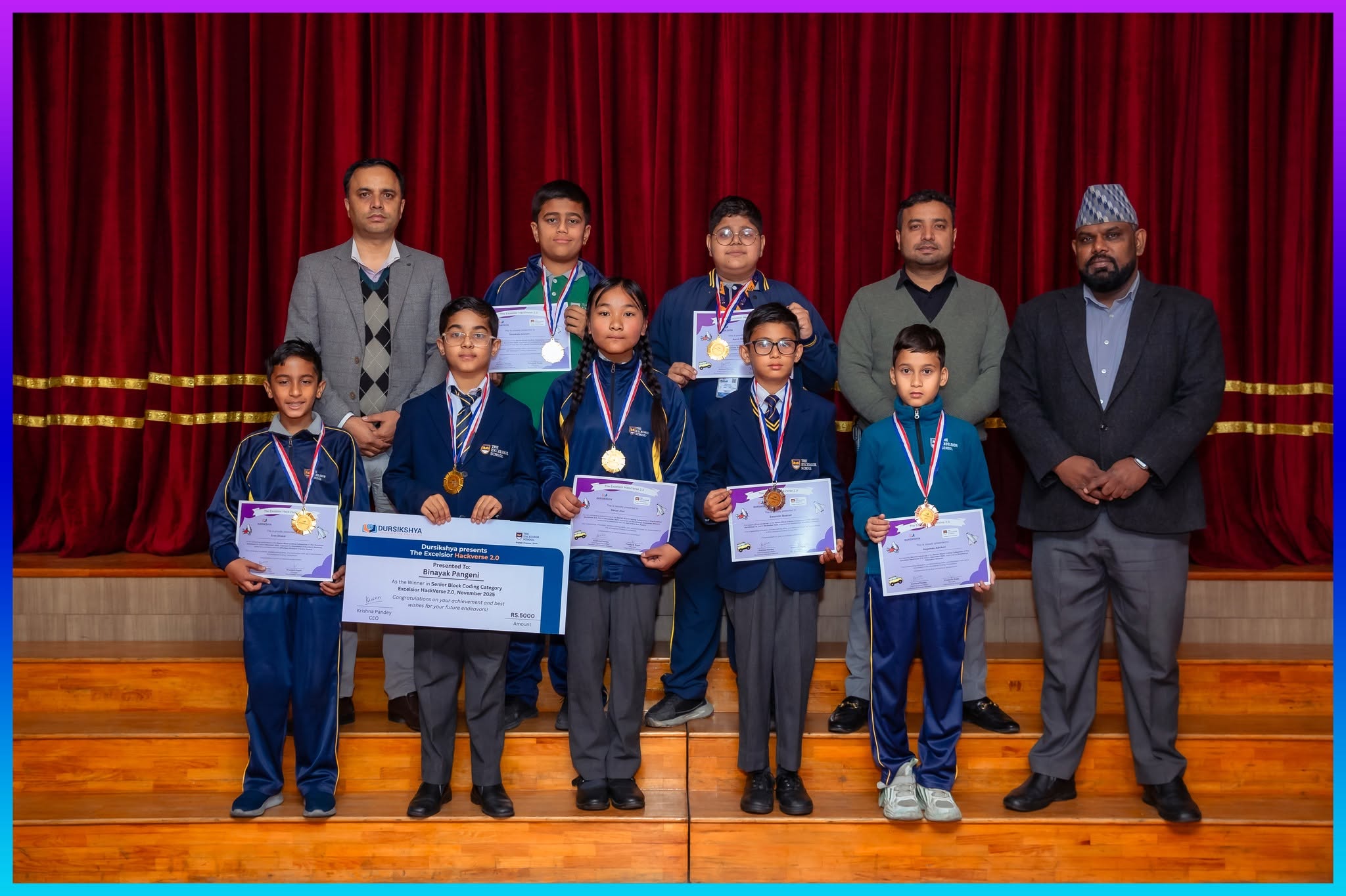 Young student winners posing with medals and certificates