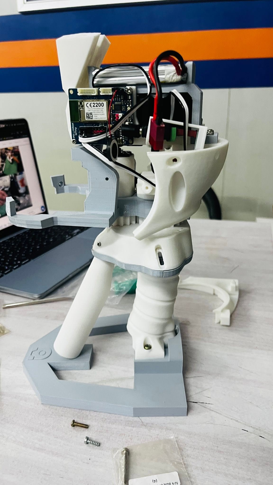 Side view of the robotic arm prototype and electronics