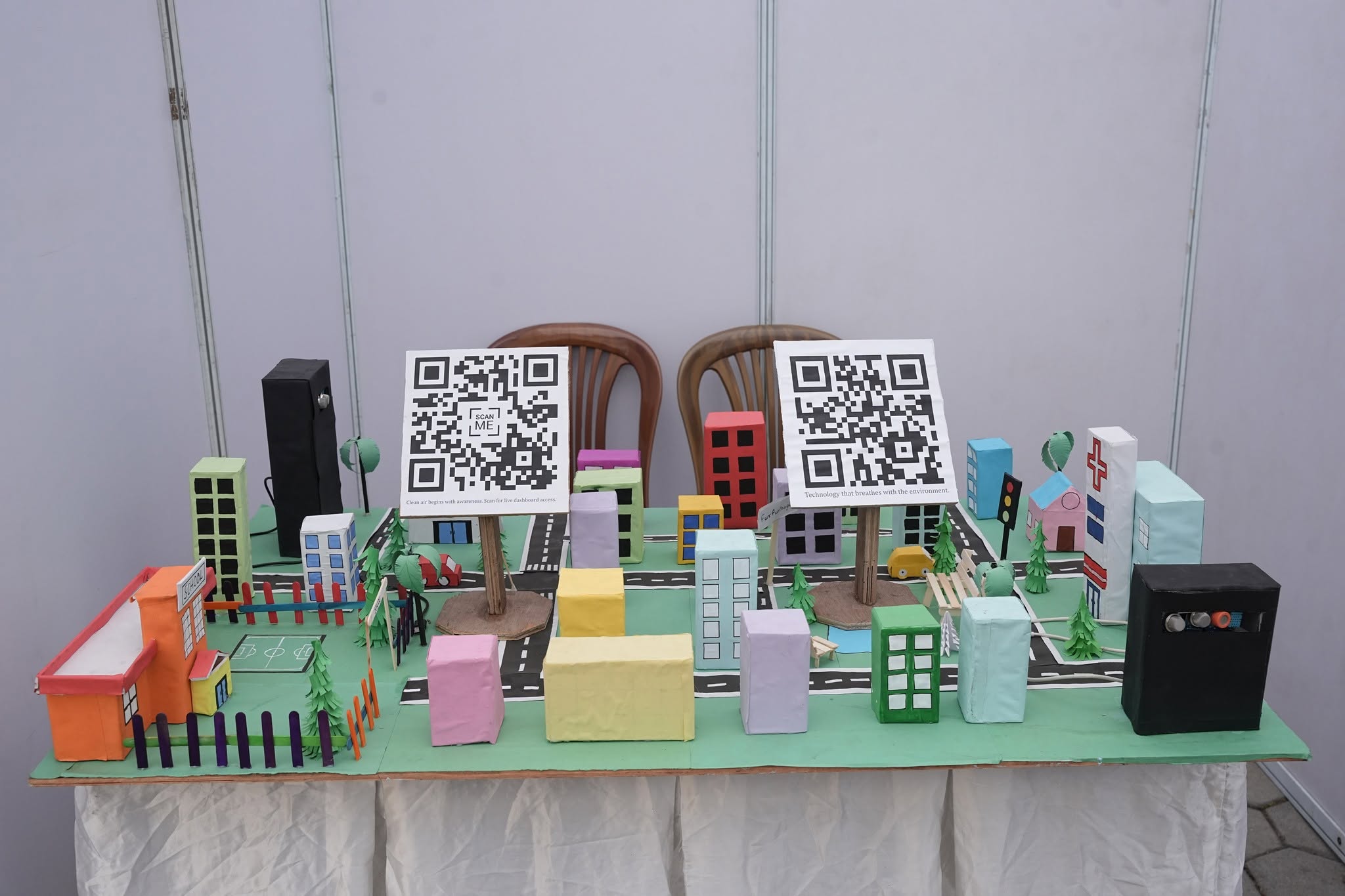 Creative city model with QR-powered information boards and public spaces